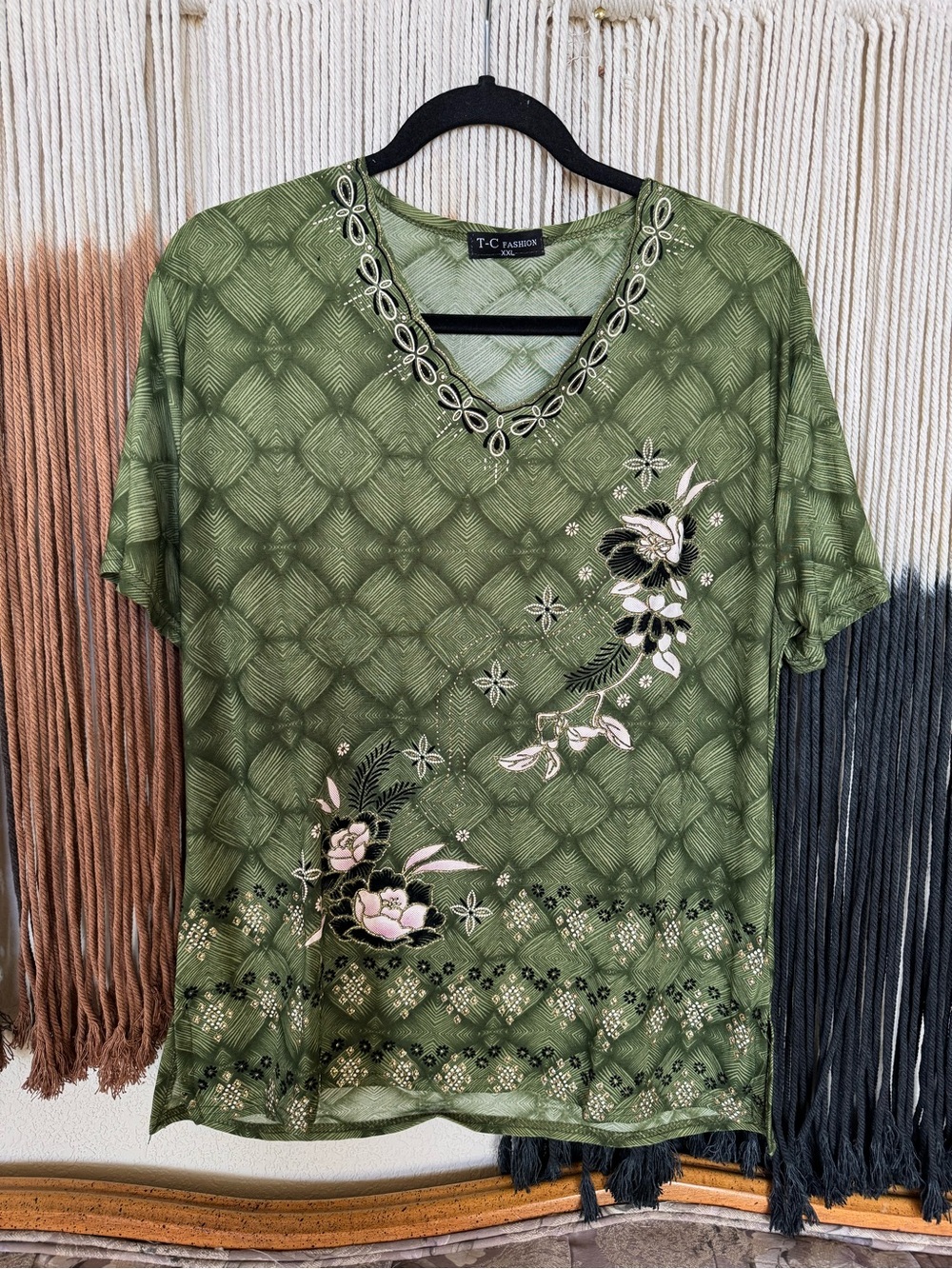 Green floral T-C Fashion shimmer top with short sleeves and scalloped v-neckline